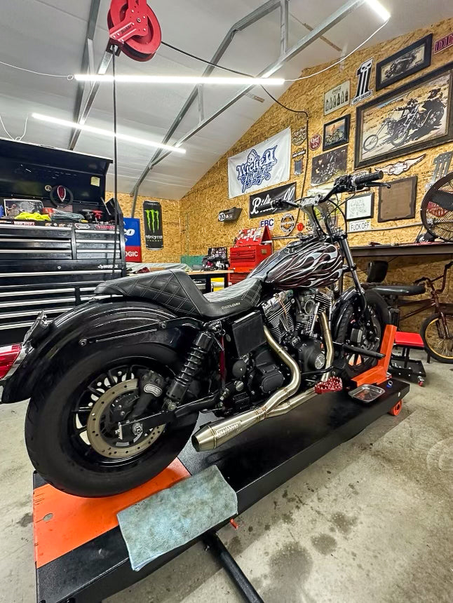 Stealth Pipes exhaust system fitted to Harley Dyna – 1996–2005 stainless headers and muffler, side view