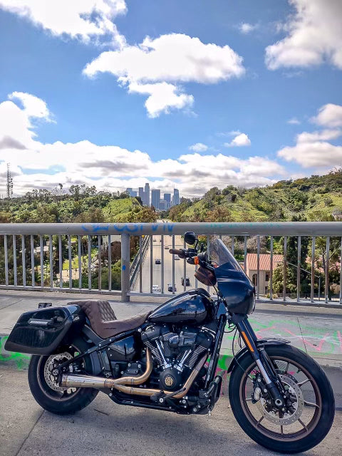Stealth Pipes exhaust system installed on Harley M8 Softail – rear-side view of muffler and headers (2017–2025)
