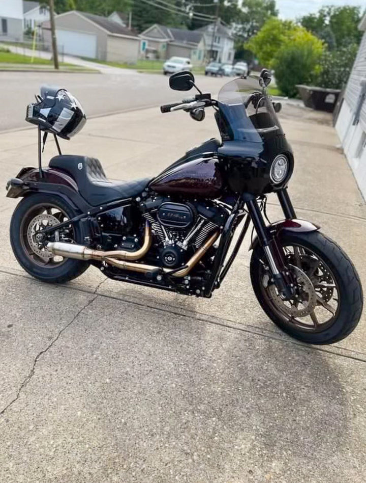 Stealth Pipes exhaust system installed on Harley M8 Softail – rear-side view of muffler and headers (2017–2025)