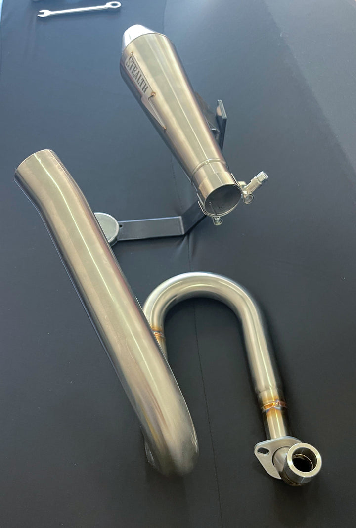 Stealth x Kruesi Originals stainless exhaust header – precision TIG welded for Honda Monkey