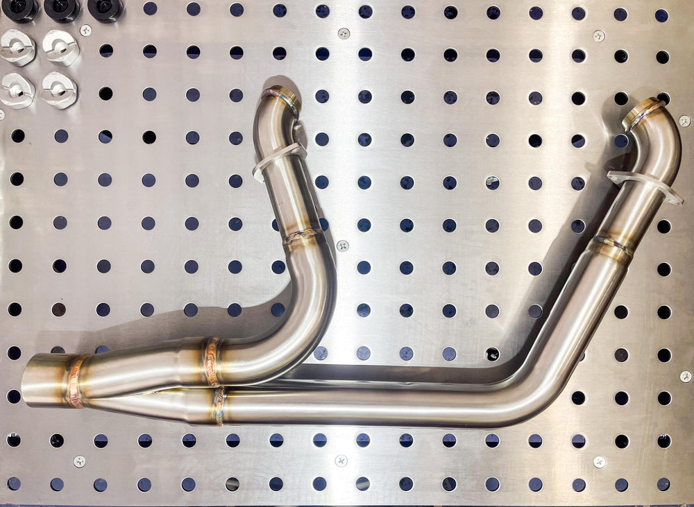 Stealth Pipes exhaust system on Harley M8 Softail 2017–2025 – stainless headers and muffler, side view