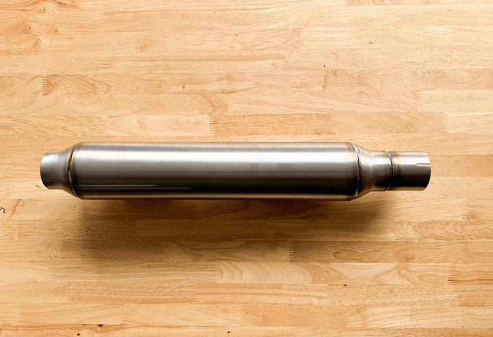 Close-up of Stealth Pipes Mid-Length Pipe Bomb Muffler – cone tip with Stealth logo engraving