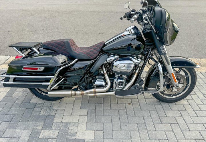 Stealth Pipes Breacher exhaust system detail view on Harley motorcycle – stainless steel headers and muffler