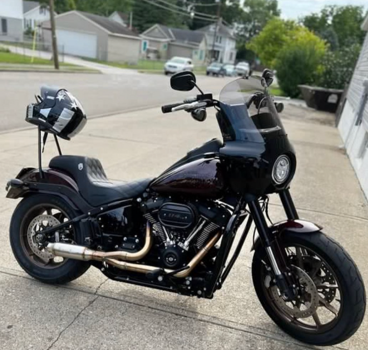 Stealth Pipes exhaust system installed on Harley M8 Softail – rear-side view of muffler and headers (2017–2025)