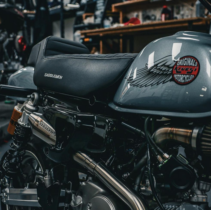 Honda Monkey with Stealth x Kruesi Originals exhaust system – rear angle showing stainless muffler