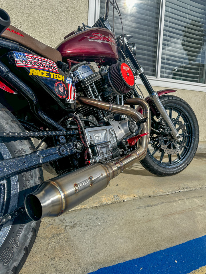 Harley Sportster motorcycle with Stealth Pipes exhaust system – rider lifestyle photo, 1986–2003 model