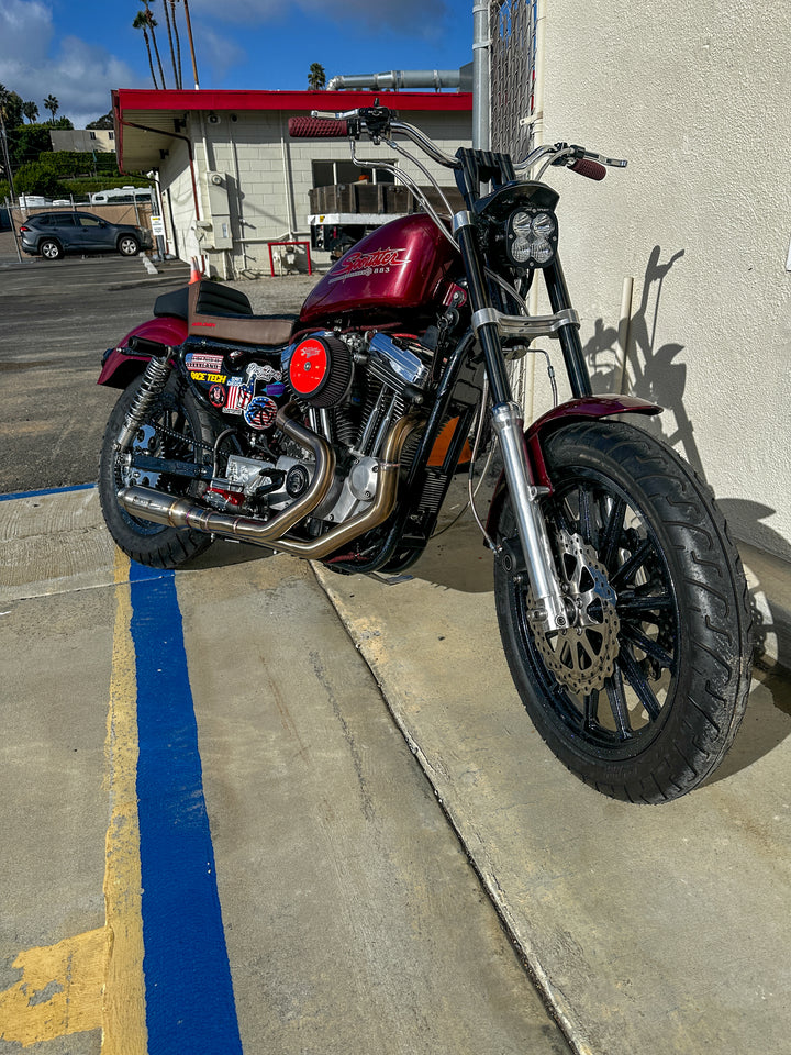 Harley Sportster motorcycle with Stealth Pipes exhaust system – rider lifestyle photo, 1986–2003 model