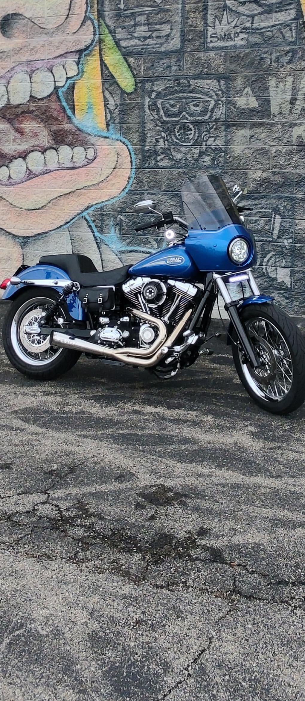 2006–2017 Harley Dyna motorcycle with Stealth Pipes exhaust system installed – stainless muffler upgrade