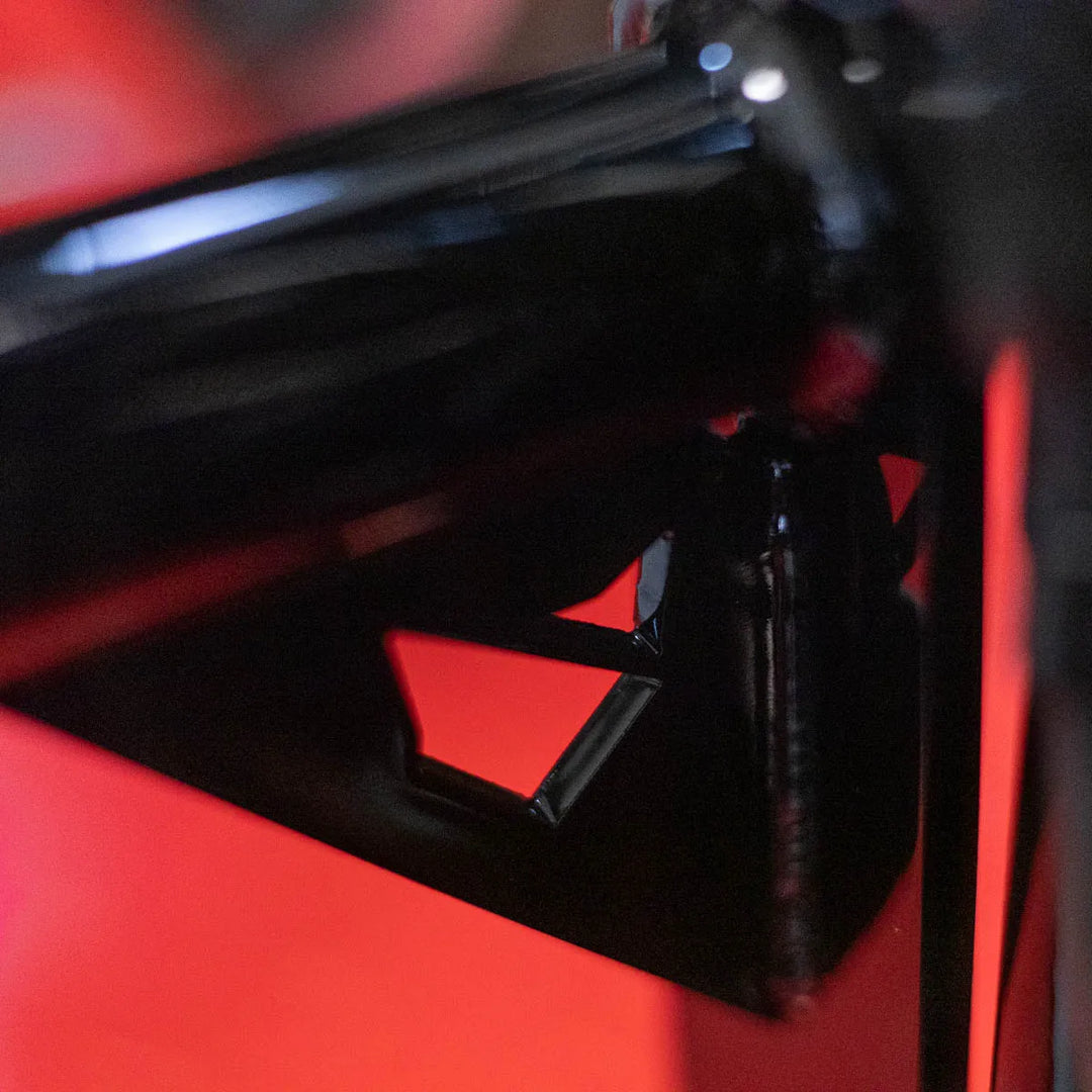 A black Softail Front Crash Bar designed for motorcycles, displayed installed on motorcycle.