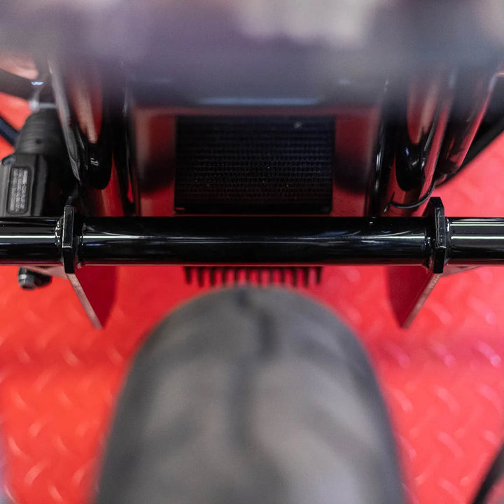 A black Softail Front Crash Bar designed for motorcycles, displayed installed on motorcycle.