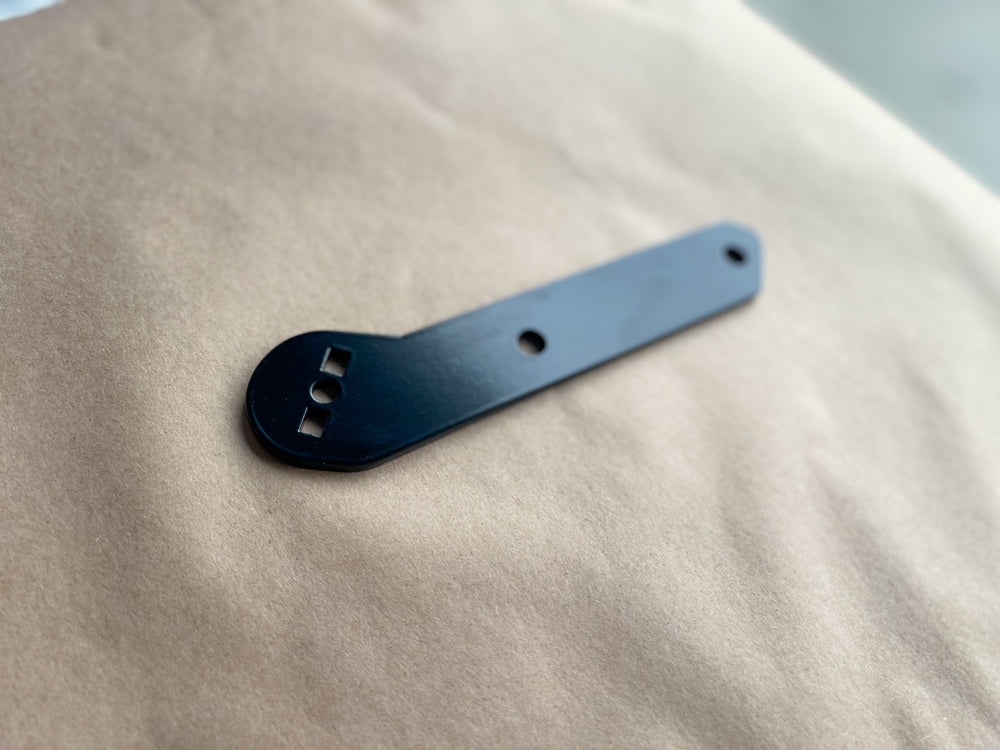Lowrider ST Baggage Support Bracket – Stealth Pipes black bracket for Harley M8 Softail fitment