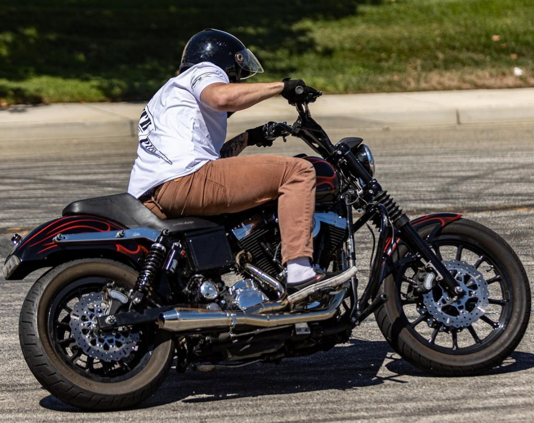 Stealth Pipes exhaust system fitted to Harley Dyna – 1996–2005 stainless headers and muffler, side view