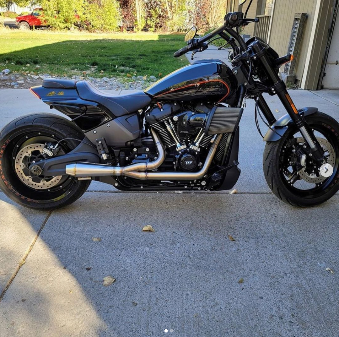 Stealth Pipes exhaust system installed on Harley M8 Softail – view of side (2017–2025)