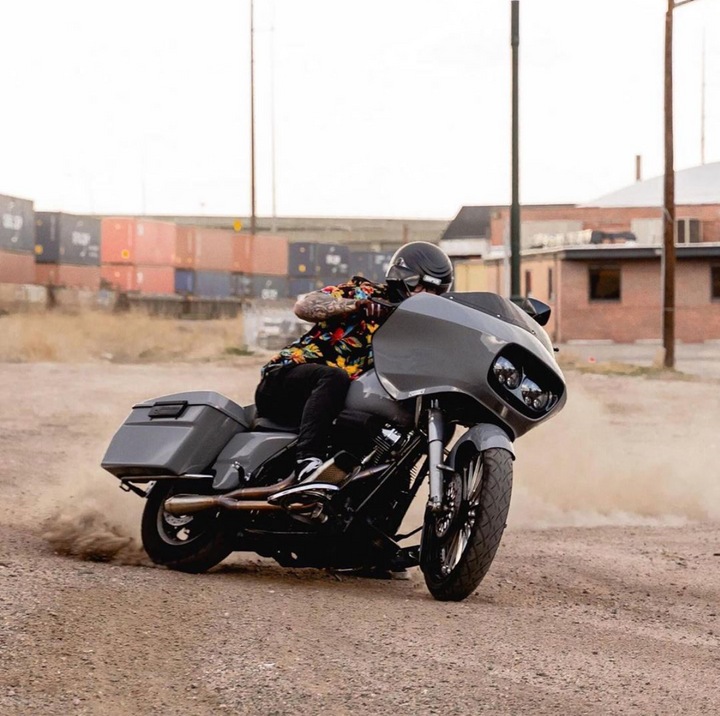 Stealth Pipes Short Bagger exhaust system – close-up rider side view on Harley touring motorcycle (1996–2016)