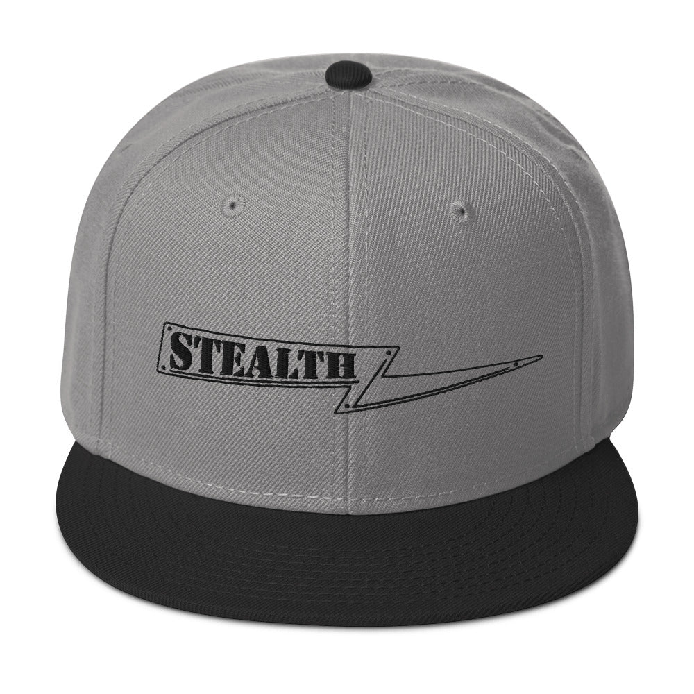 Dark grey Stealth Pipes snapback hat with flat visor and embroidered logo